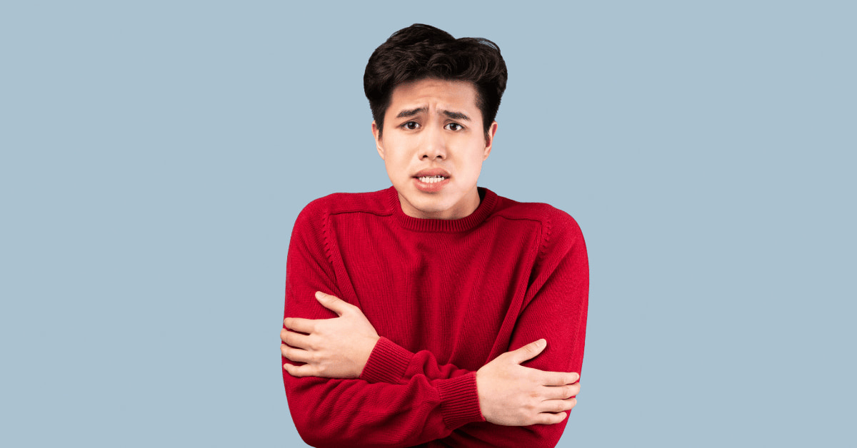 Man feeling discomfort that may contribute to dry eye symptoms due to cold or dry air exposure.