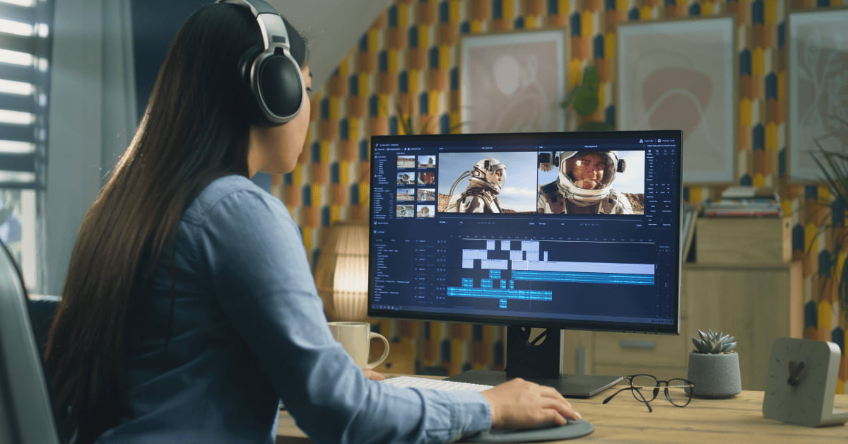 Woman working on a computer for long hours, increasing eye strain and risk of dry eye symptoms.