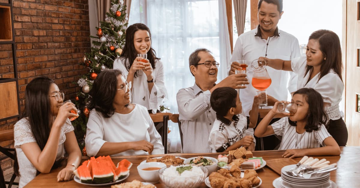 “Family gathering during a meal showing connection and emotional support, promoting mental health and well-being across all ages